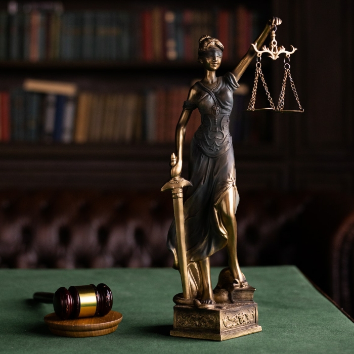 lady justice statue and a gable