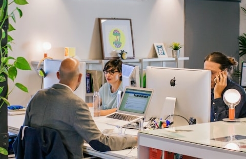 people sitting in an office